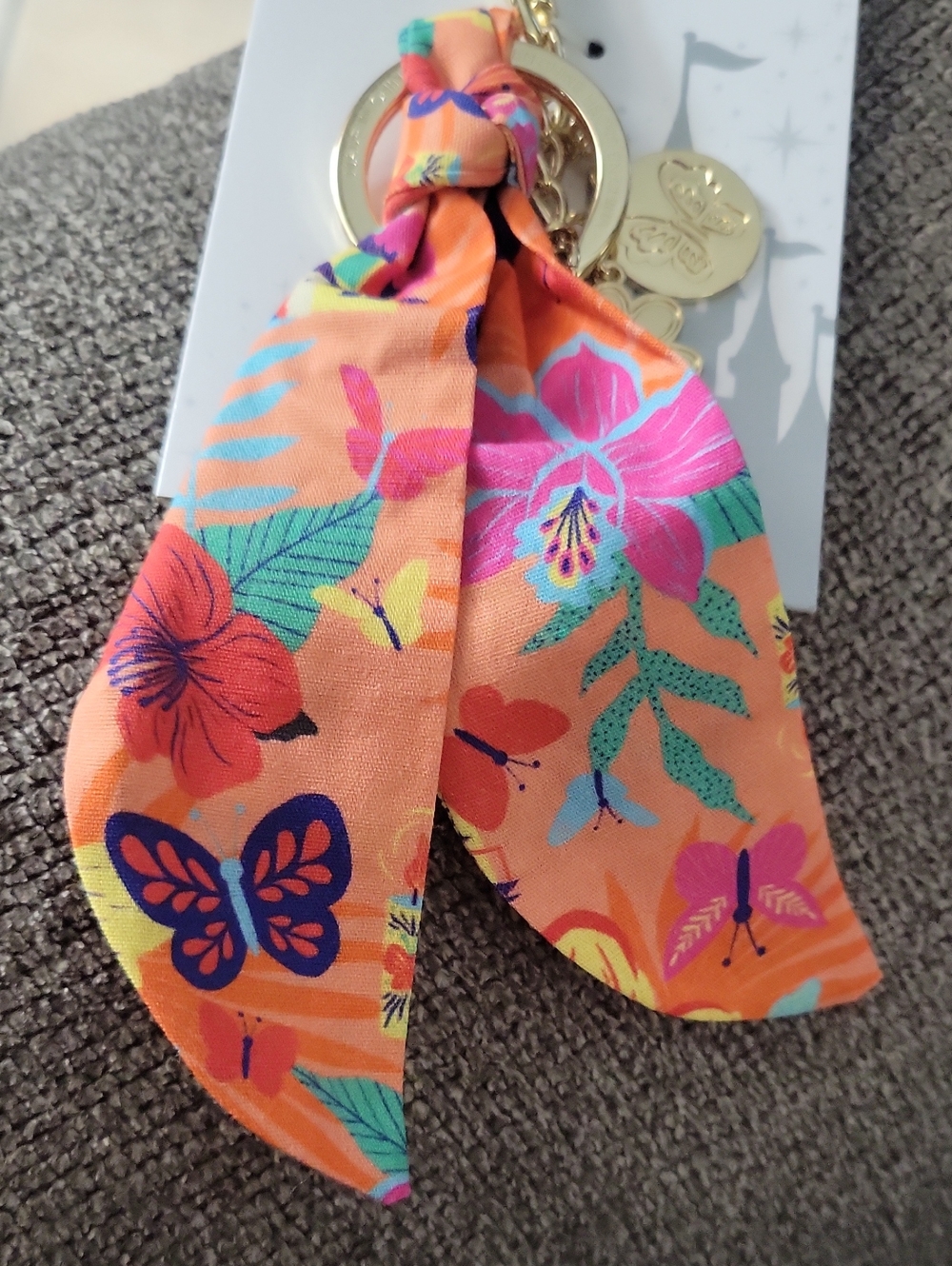 Disney Gold-Tone Tropical Floral Key Holder.  With gold Charms